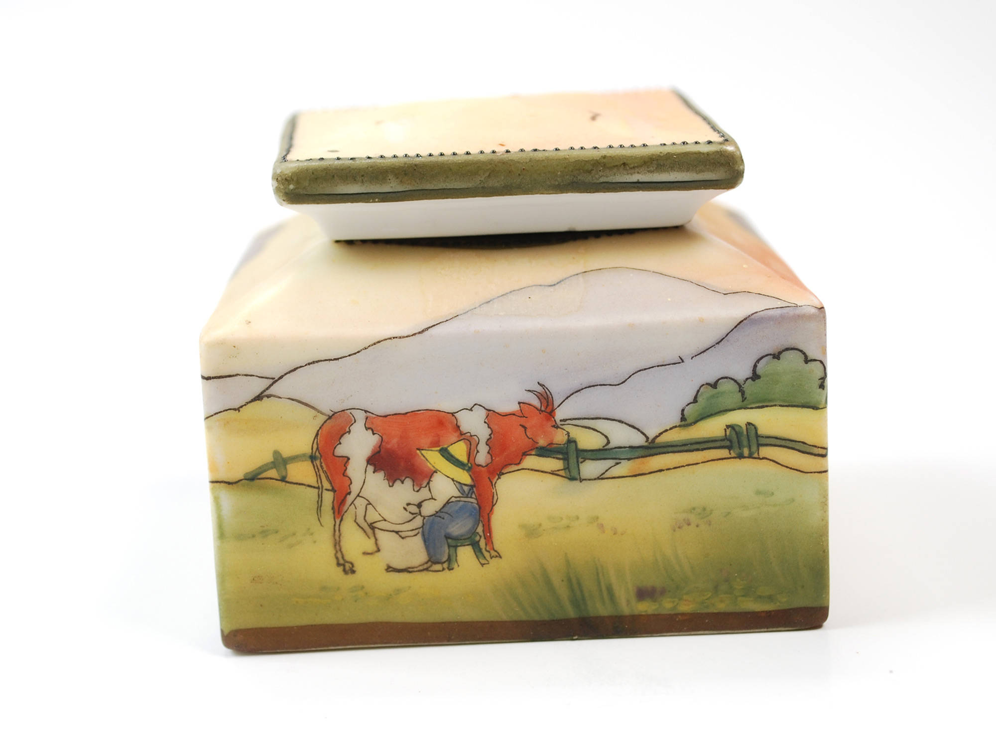 Nippon-Square with Milkmaid Milking Cow