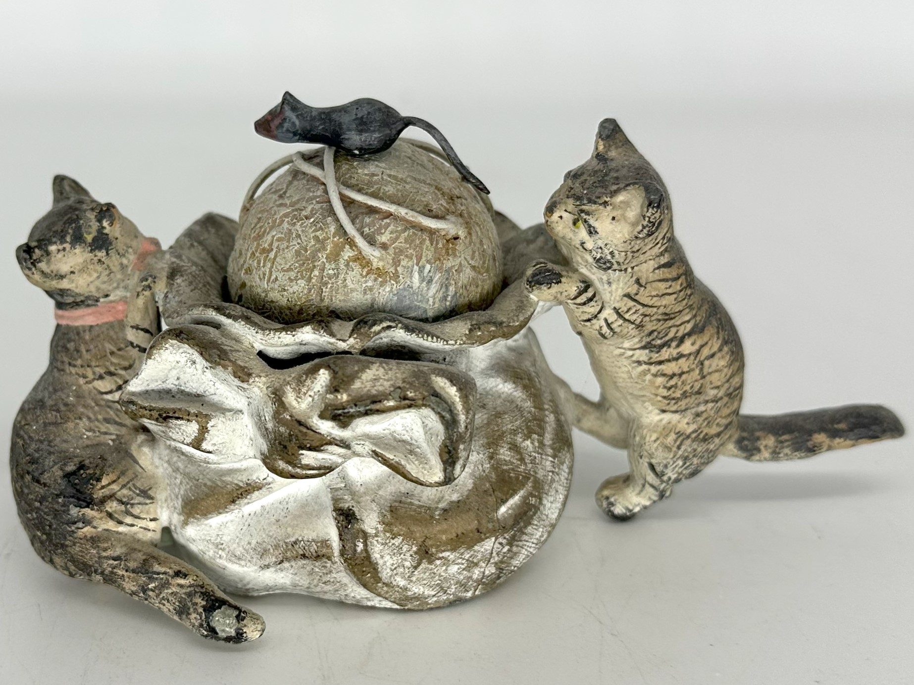 Cats Chasing a Mouse