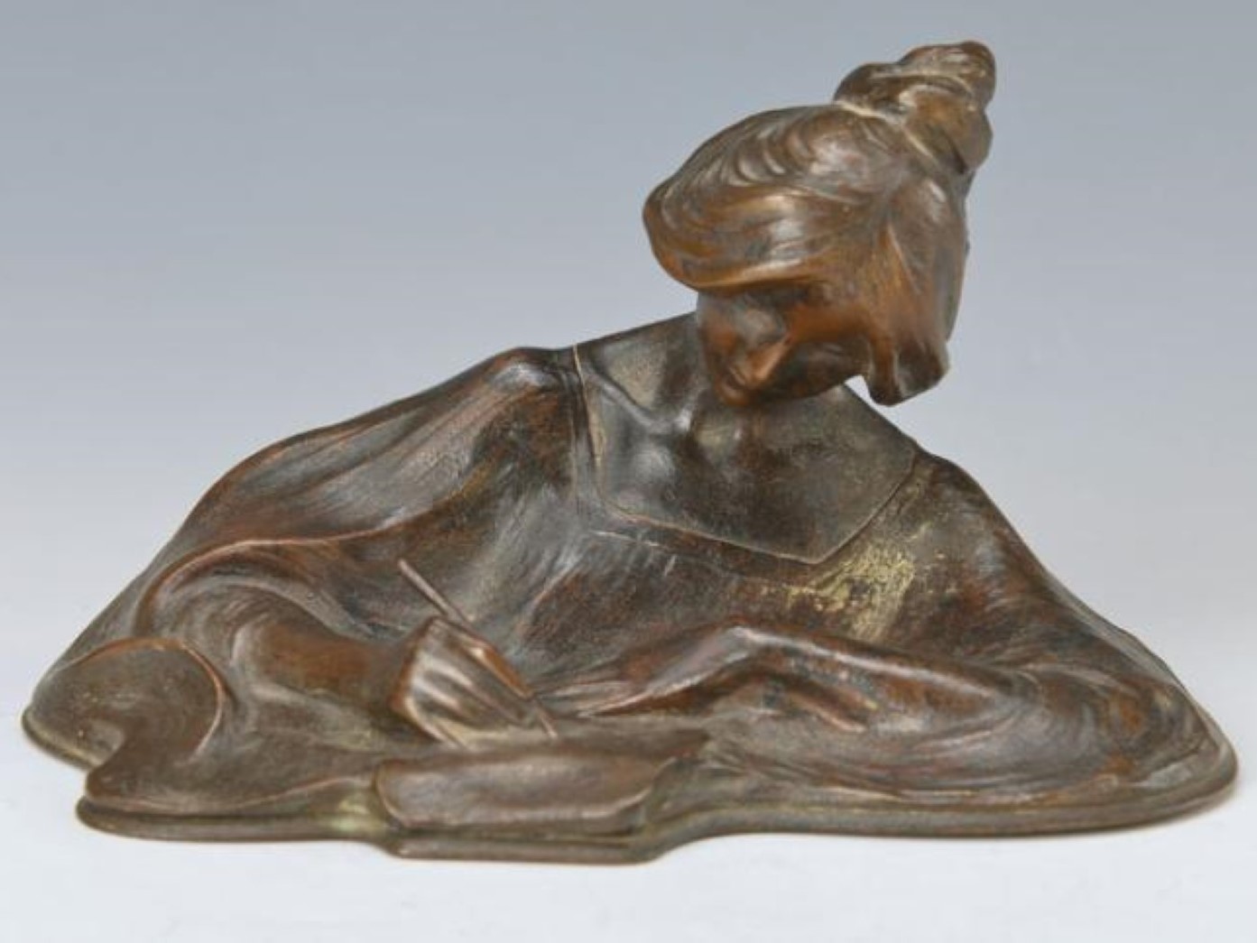 Pensive Woman Writing