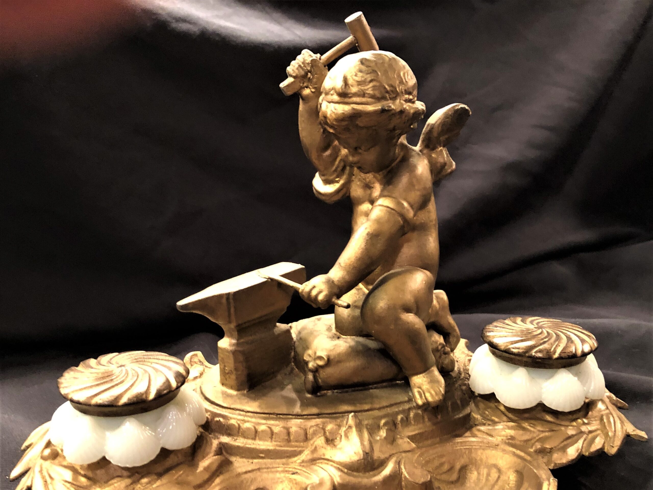 Cupid Forges an Arrow
