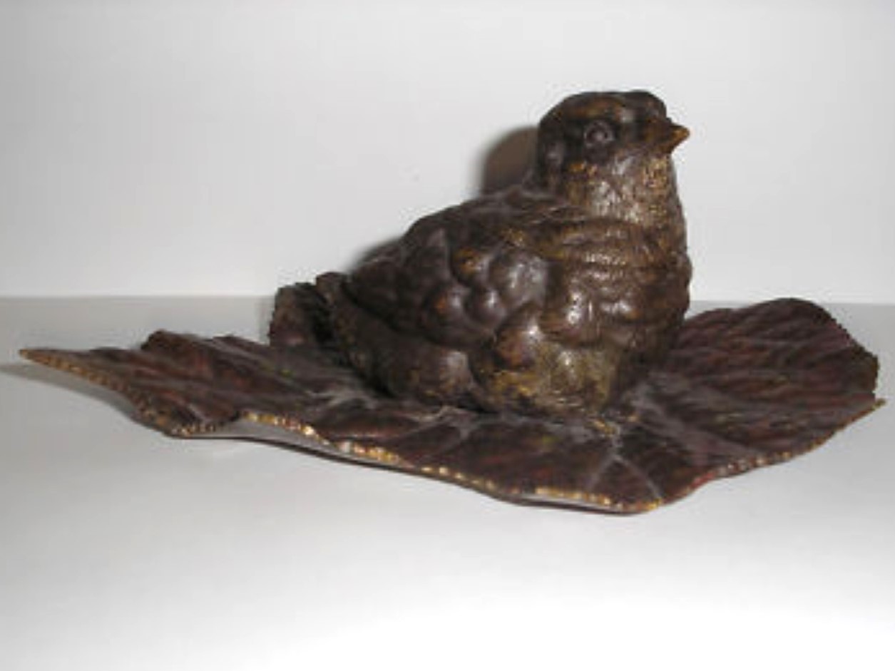 Bronze Bird on a Leaf