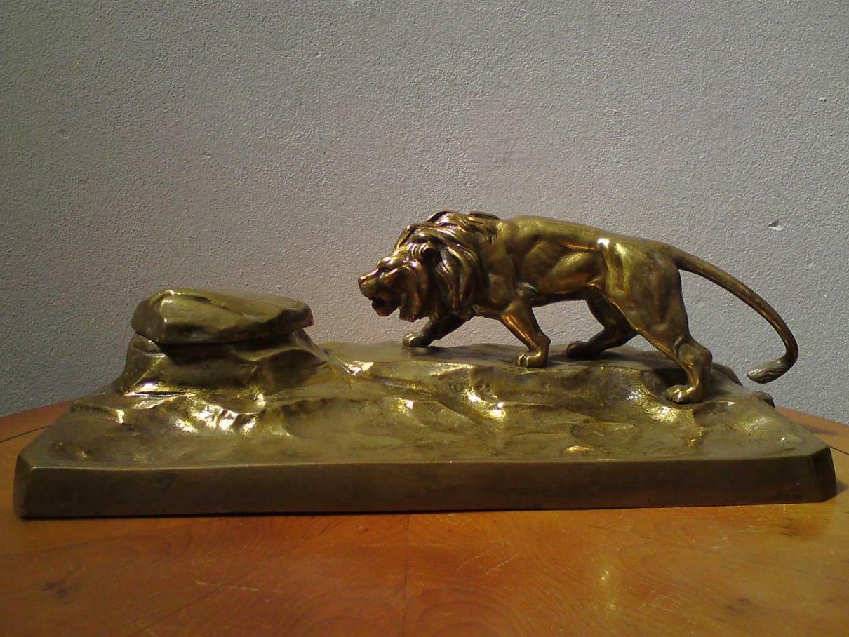 Bronze Lion on the Rocks