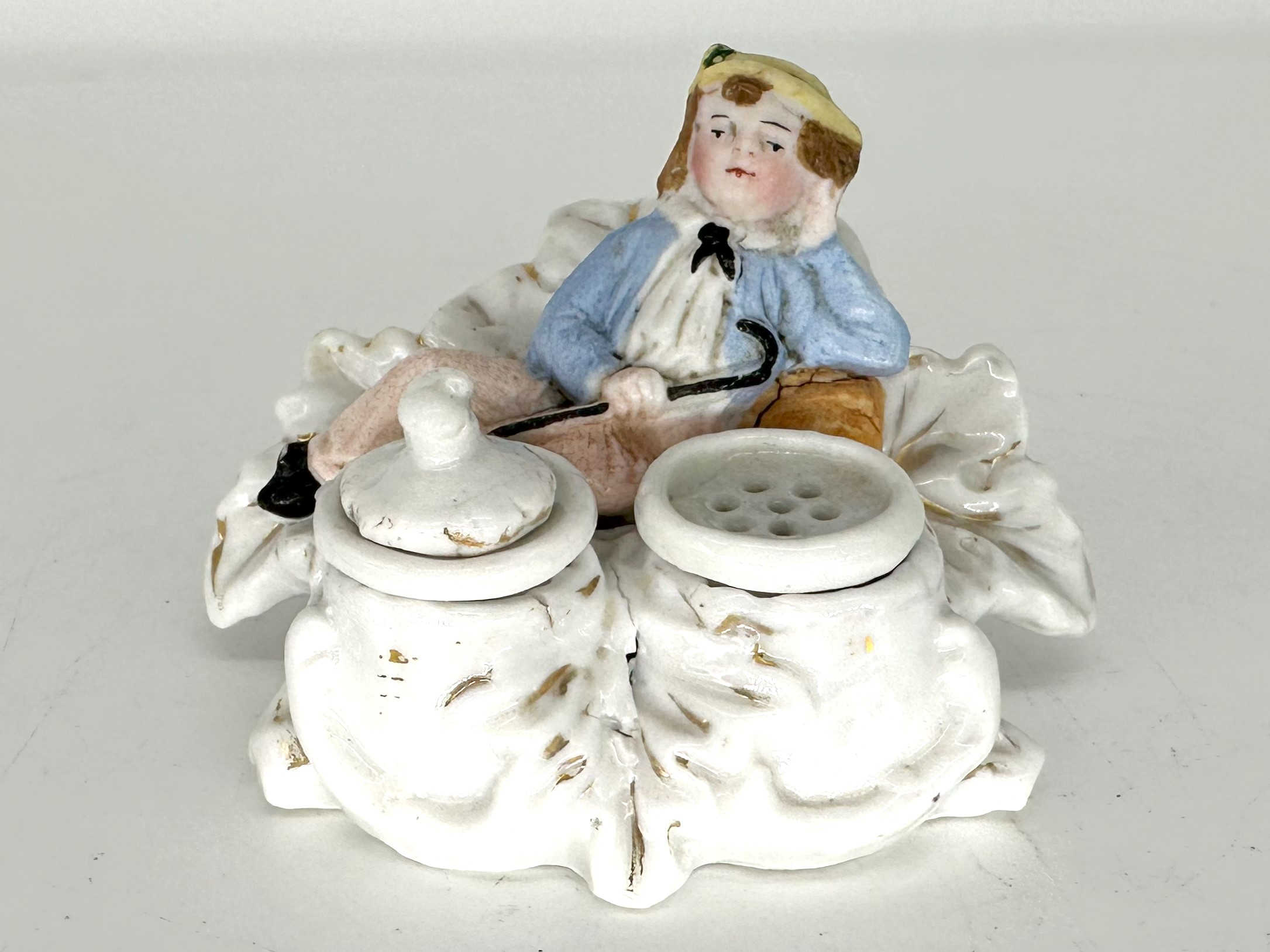 Boy Lounging with Cane – Miniature