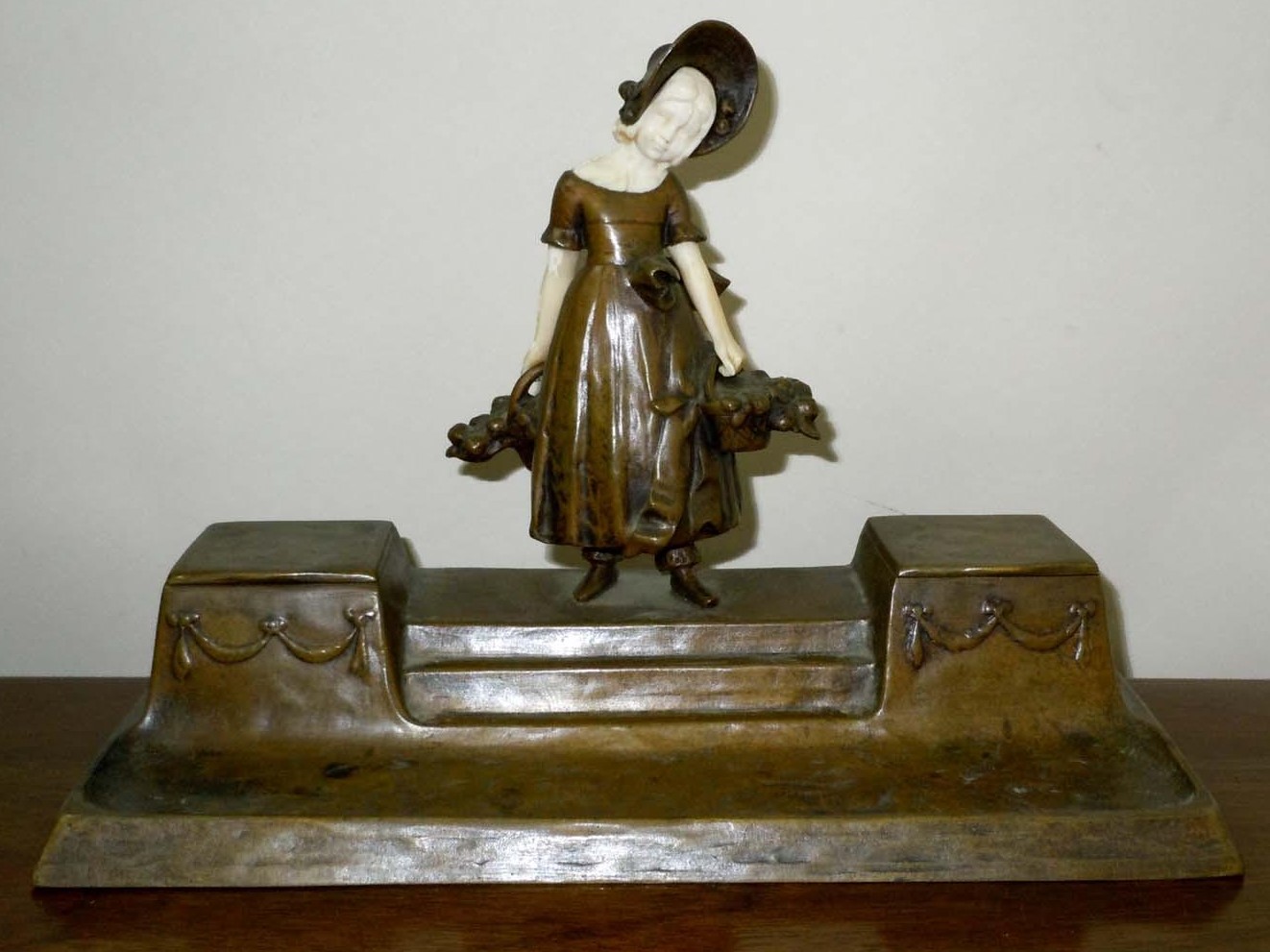 Bronze Girl with Baskets
