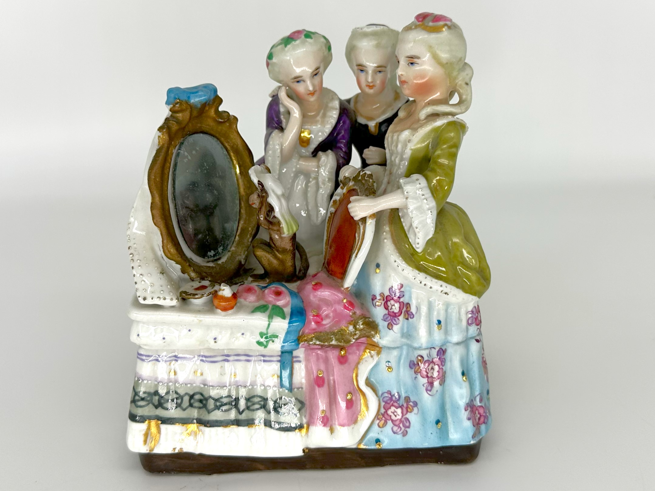 Three Ladies and a Monkey