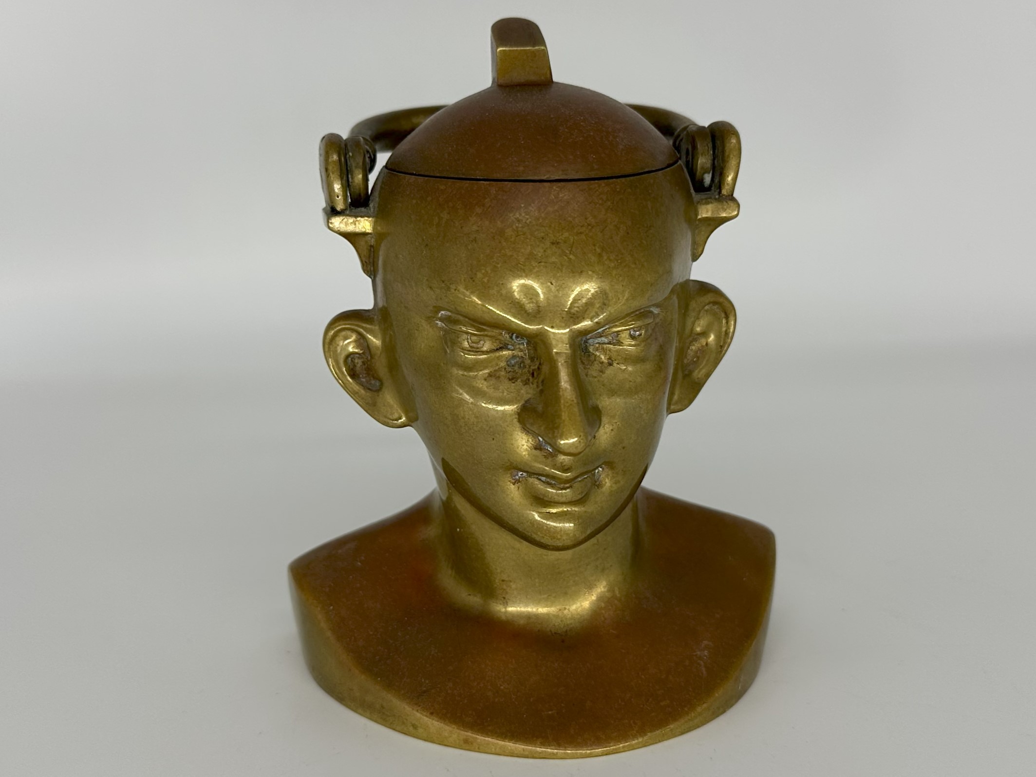 Unusual Bust-form Brass Inkwell