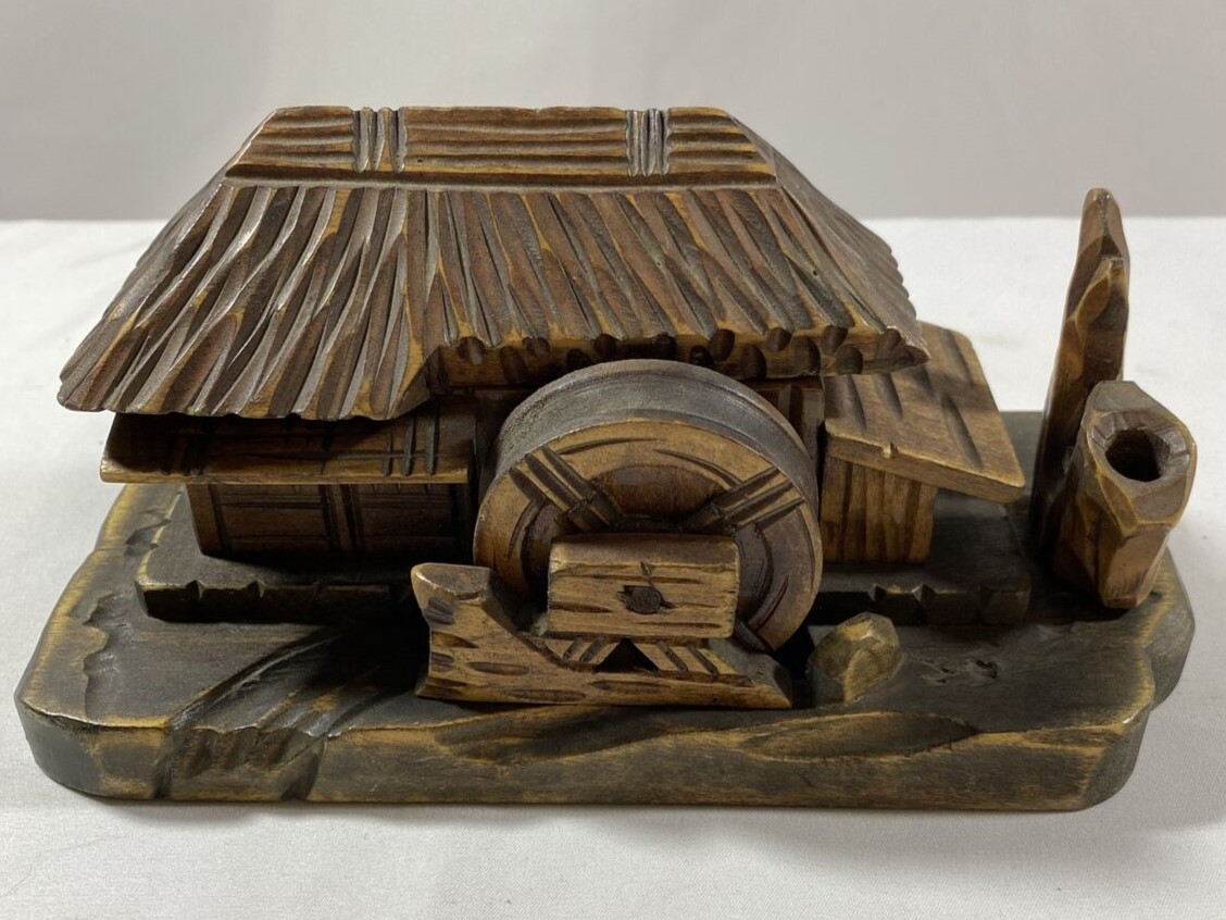Carved Waterwheel House with Stream