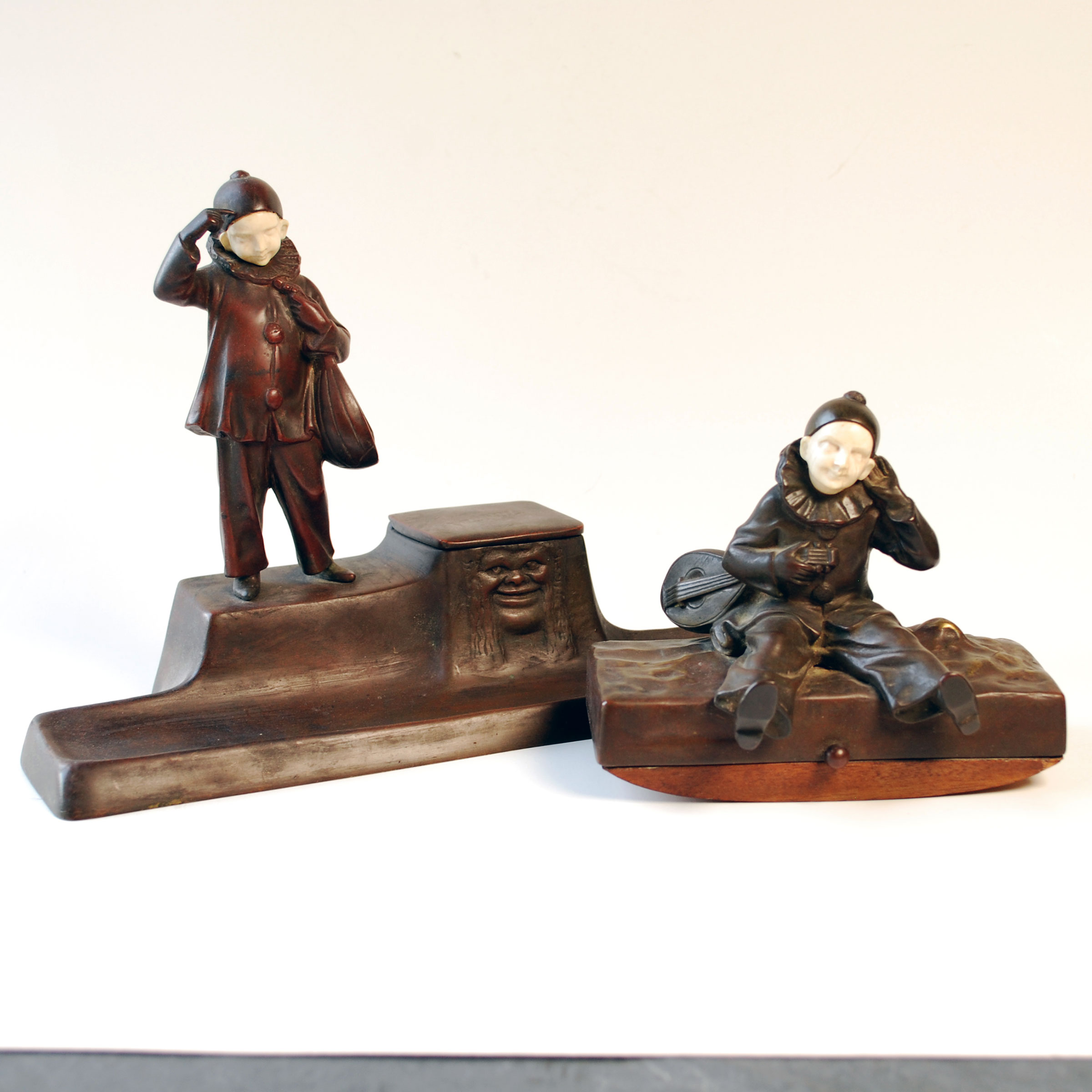 Austrian bronze figural inkstand and blotting roller, ivory faces