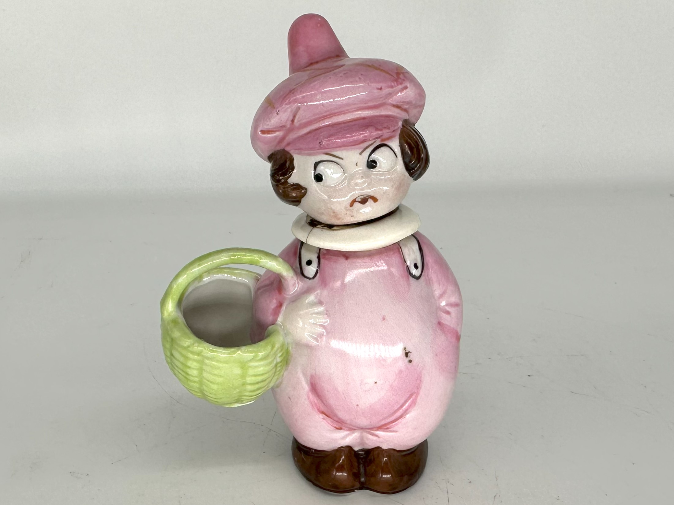 Googly-eyed Child with Basket