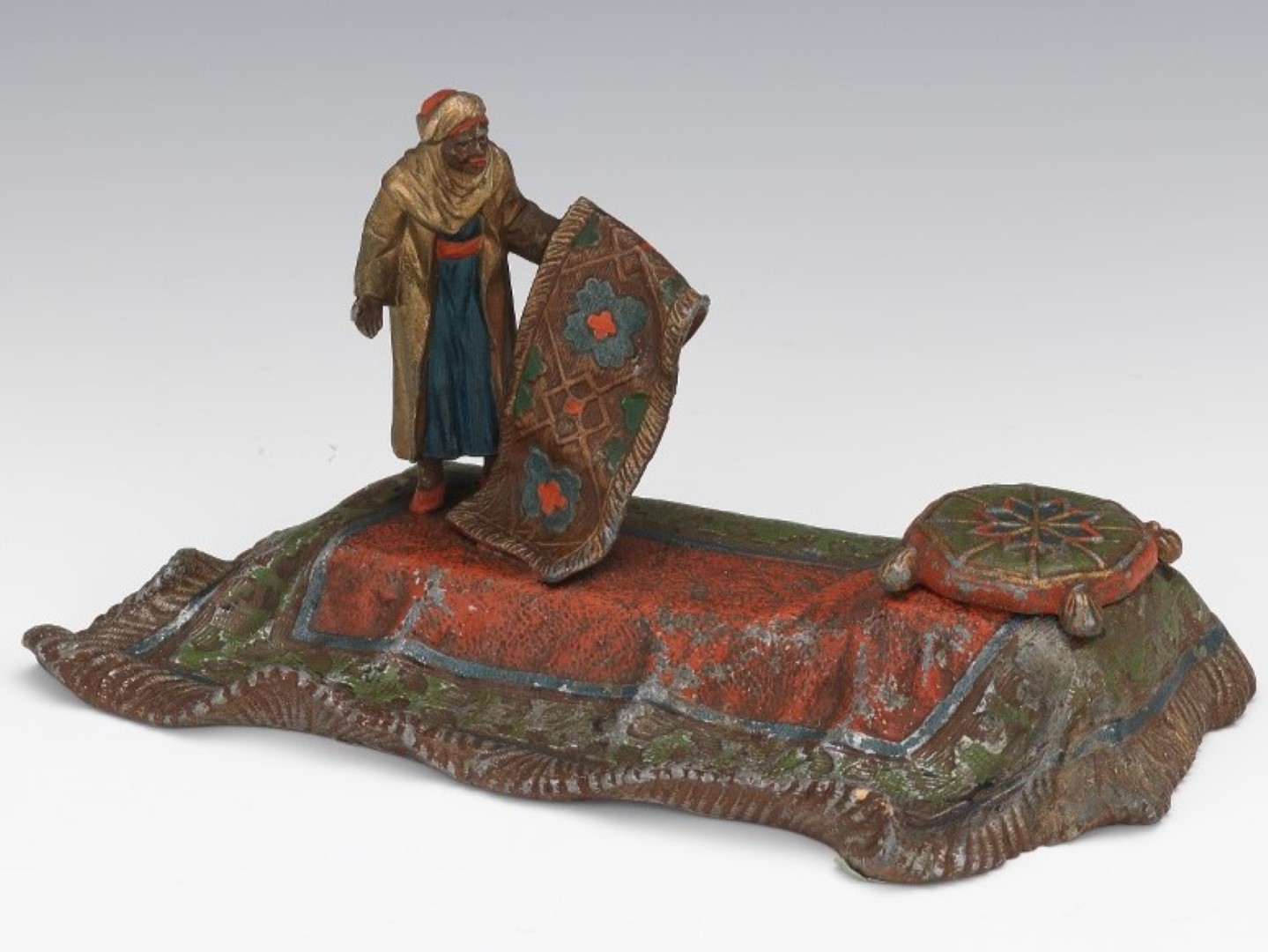 Rug Seller on an Oriental Carpet