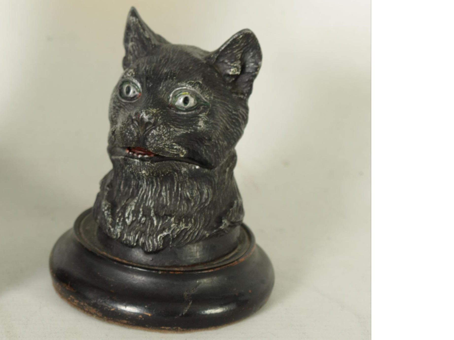 Cat on a Wood Base