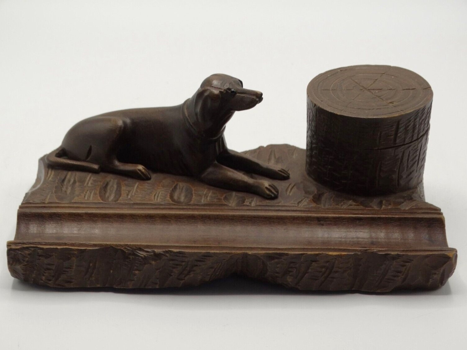 Wooden Dog Next to a Stump