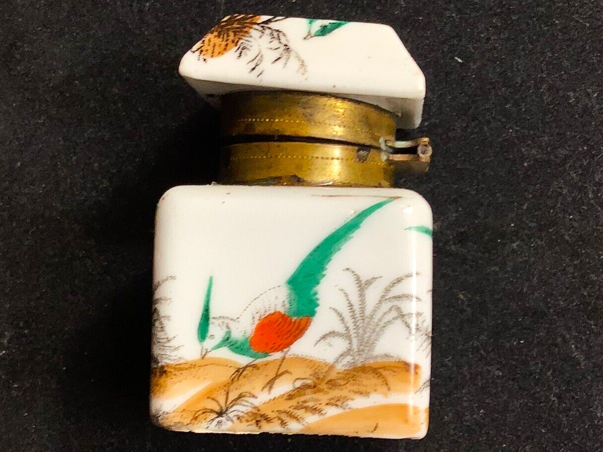 Hand Painted Bird on Porcelain