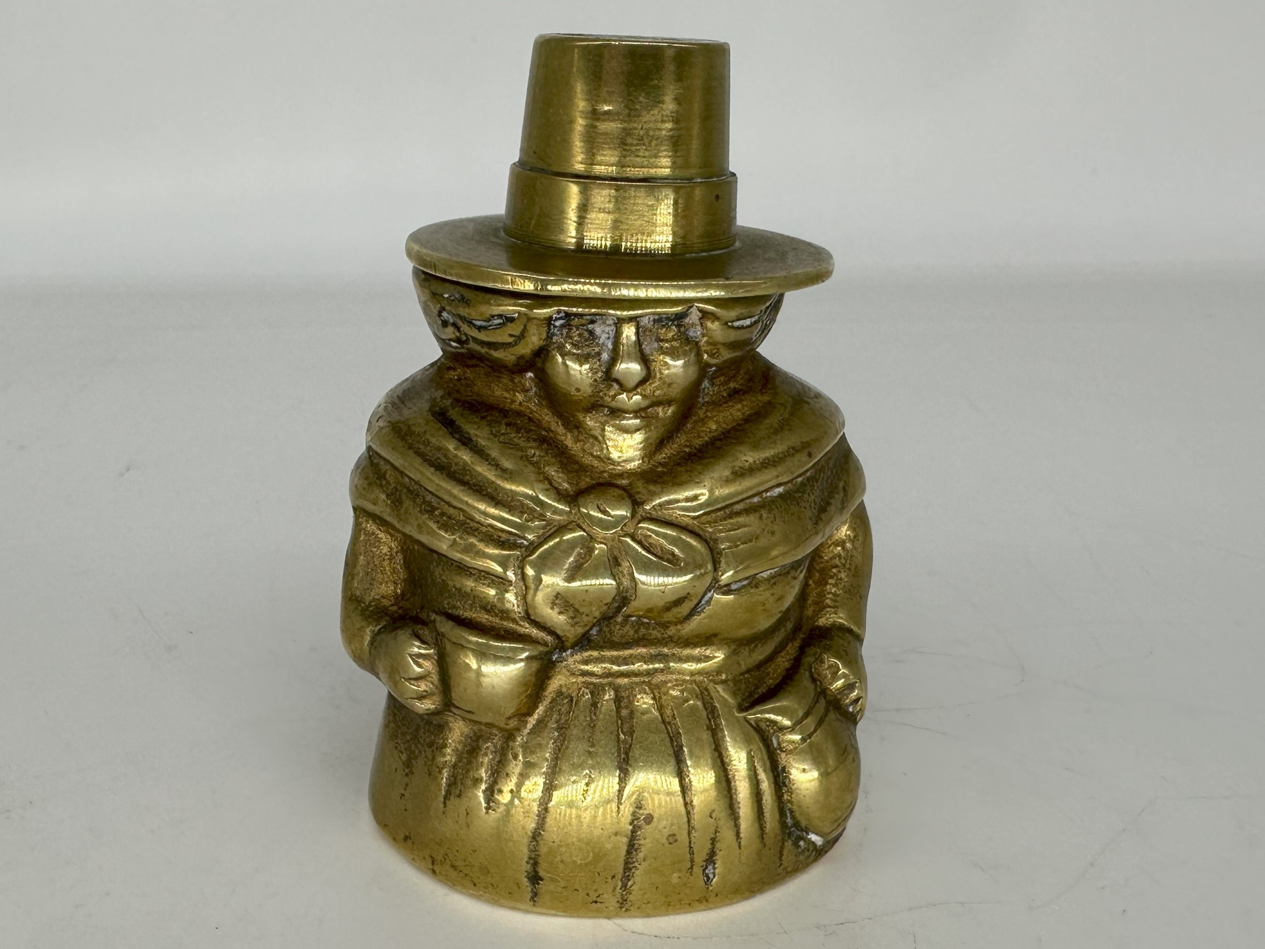 Brass Barmaid Wearing a Welsh Hat