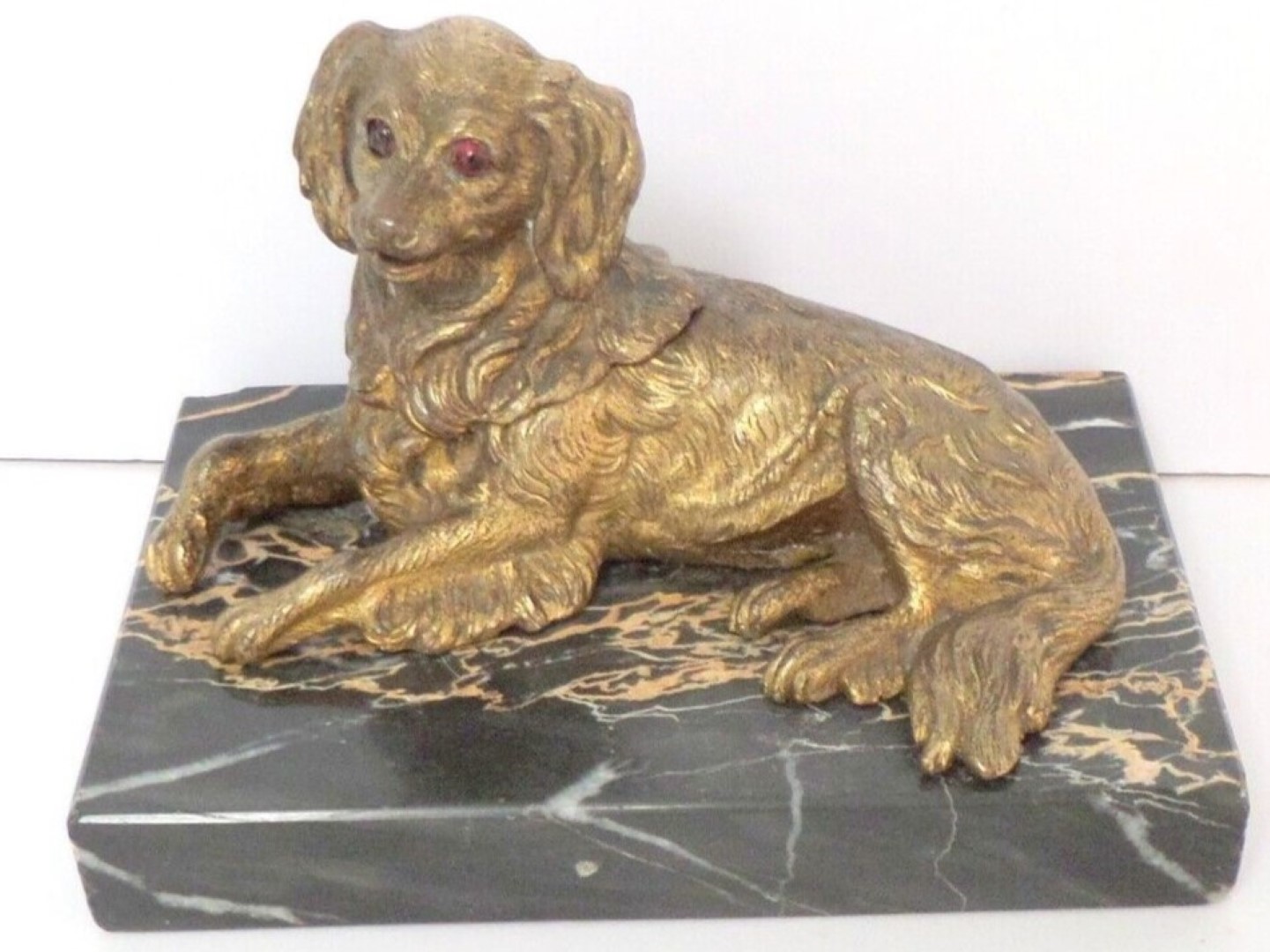 Recumbent Ormolu Dog on a Marble Plinth