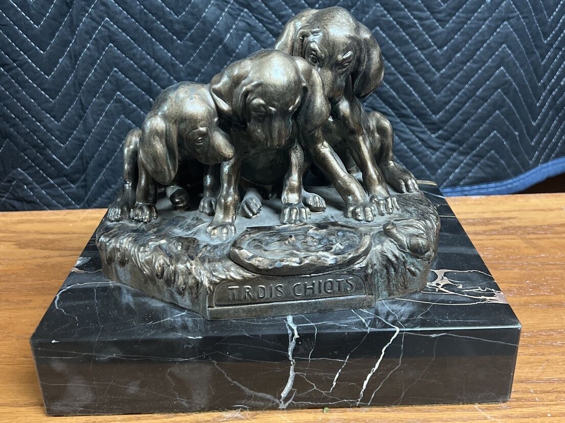 Three Puppies Sculpture