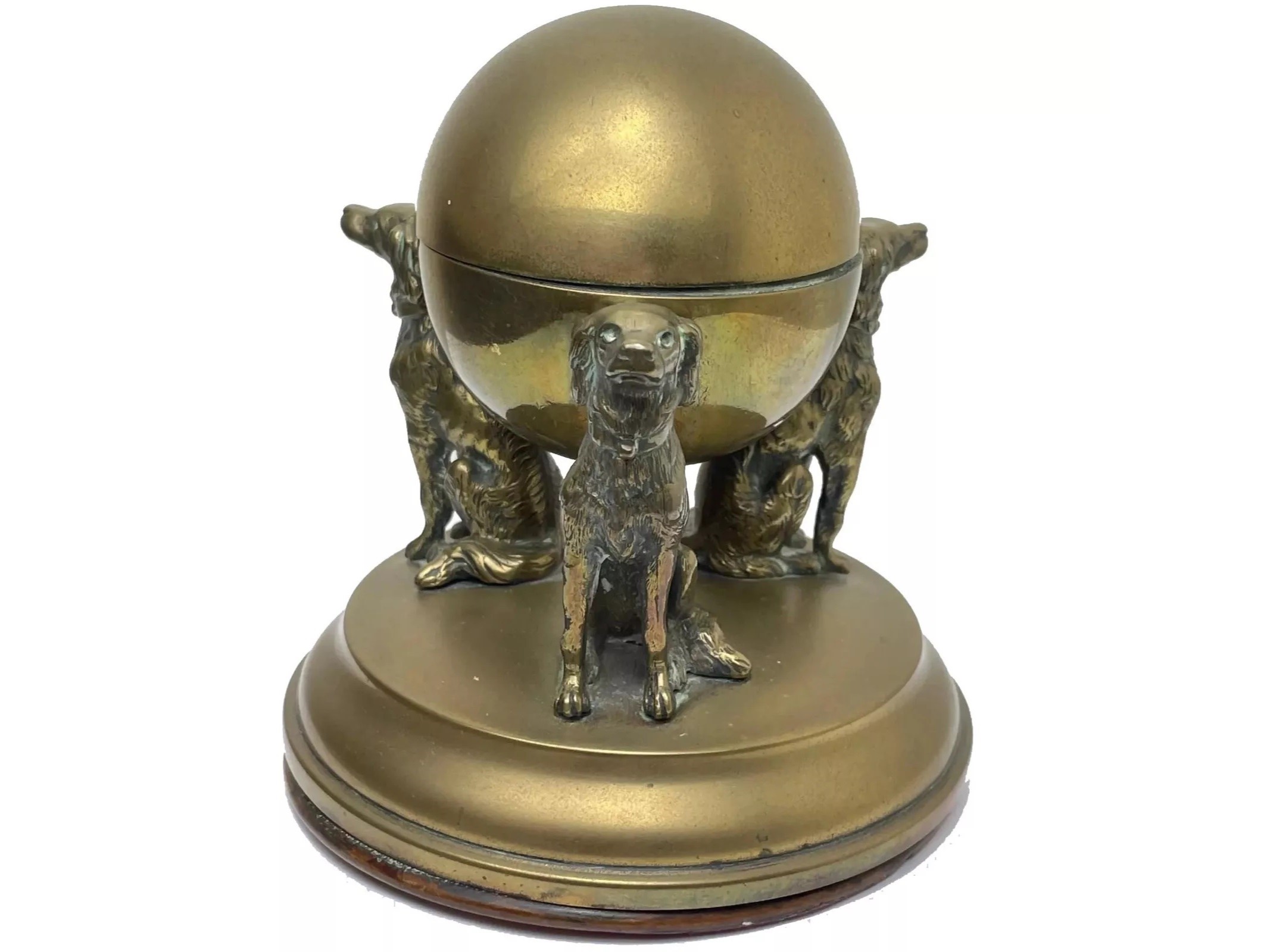 Three Sitting Dogs Support a Globe-shaped Inkwell