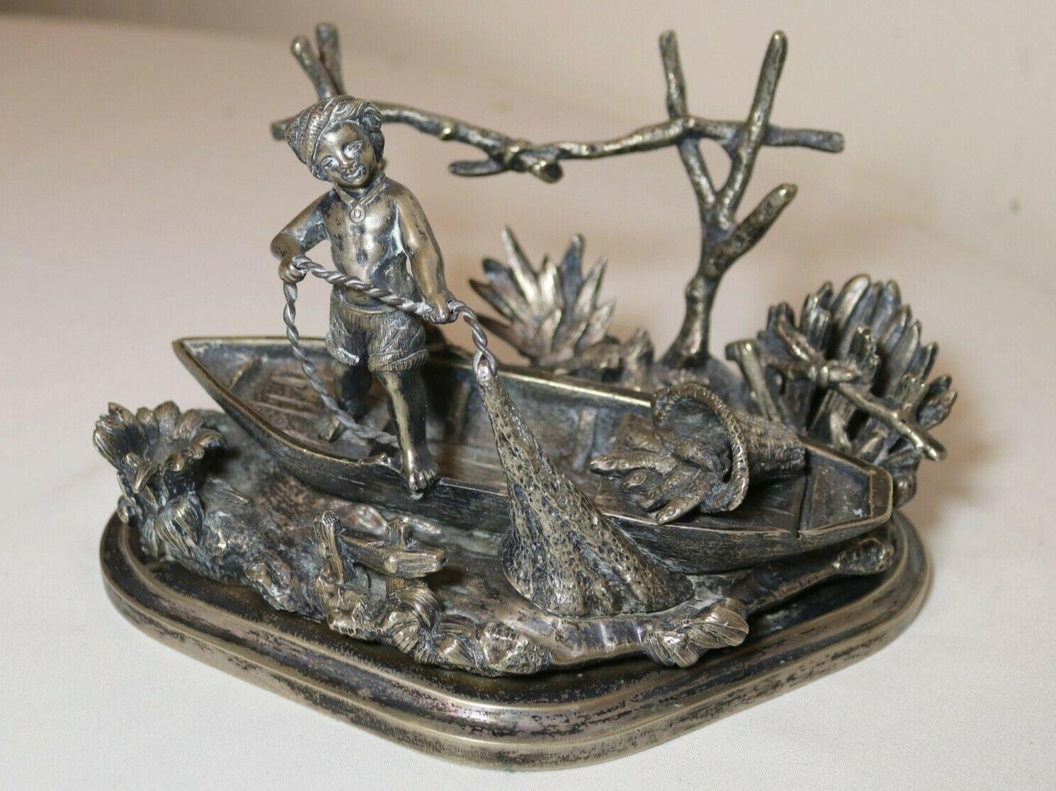 Boy Fishing on a Boat