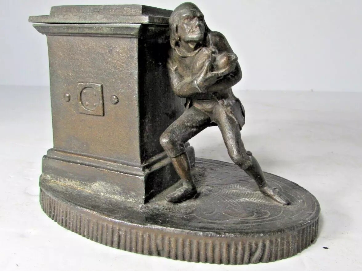 A Thief Holding Bags of Money