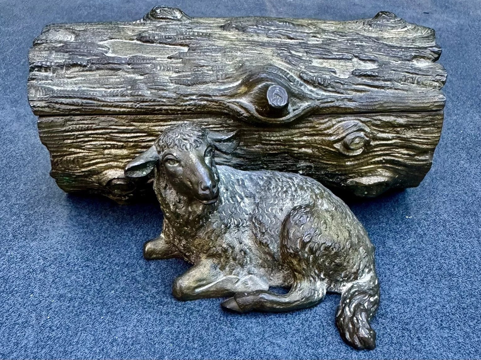 Recumbent Lamb and Inscription